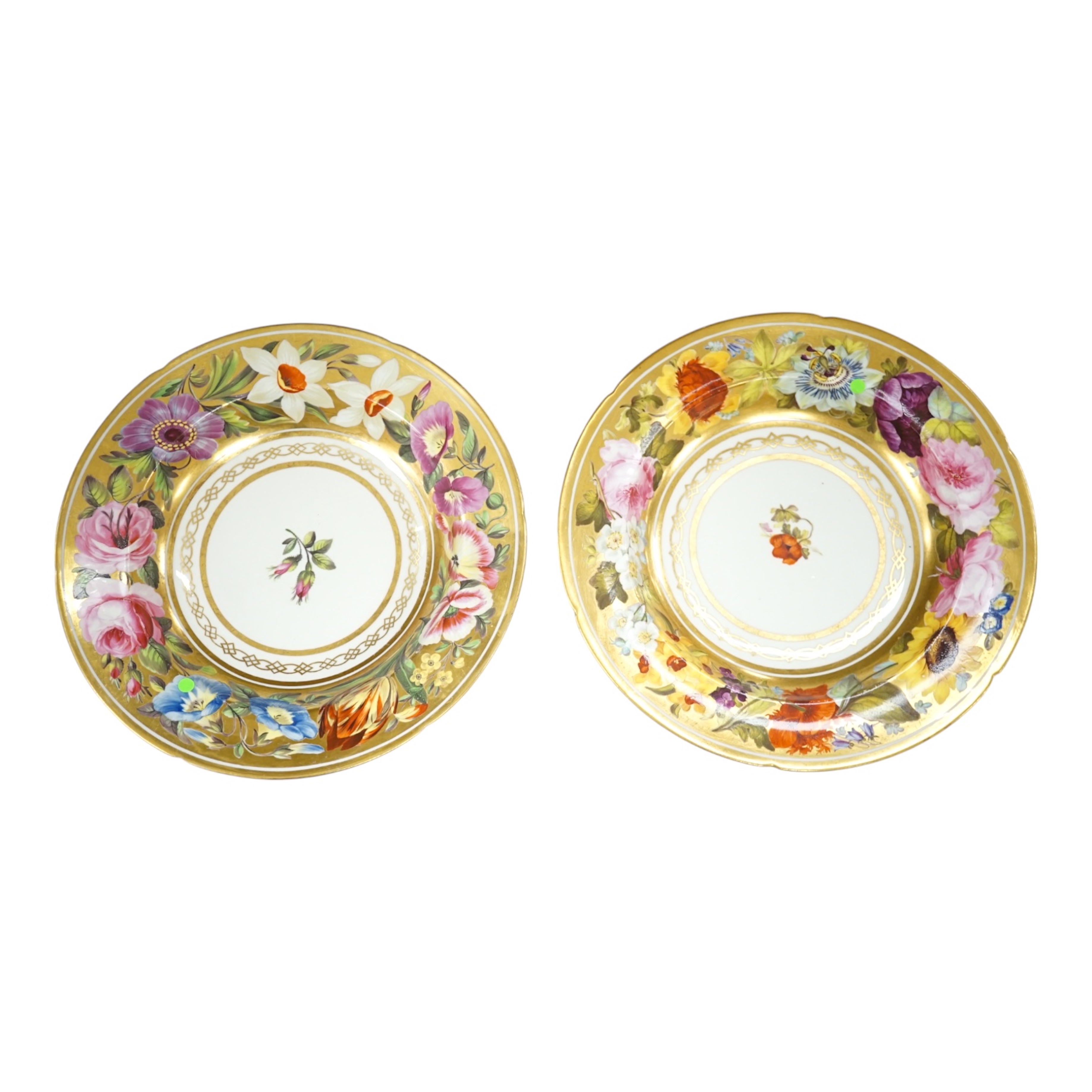 Two early 19th century Derby soup dishes with floral and gilt decoration, 25cm diam. Condition - good